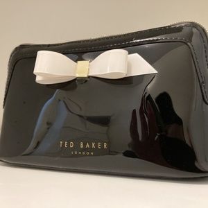 (NWOT) Ted Baker London black Calgary’s bag
Beauty bag